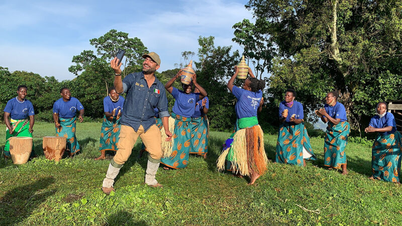 Arturo Islas with Dancers in Bwindi