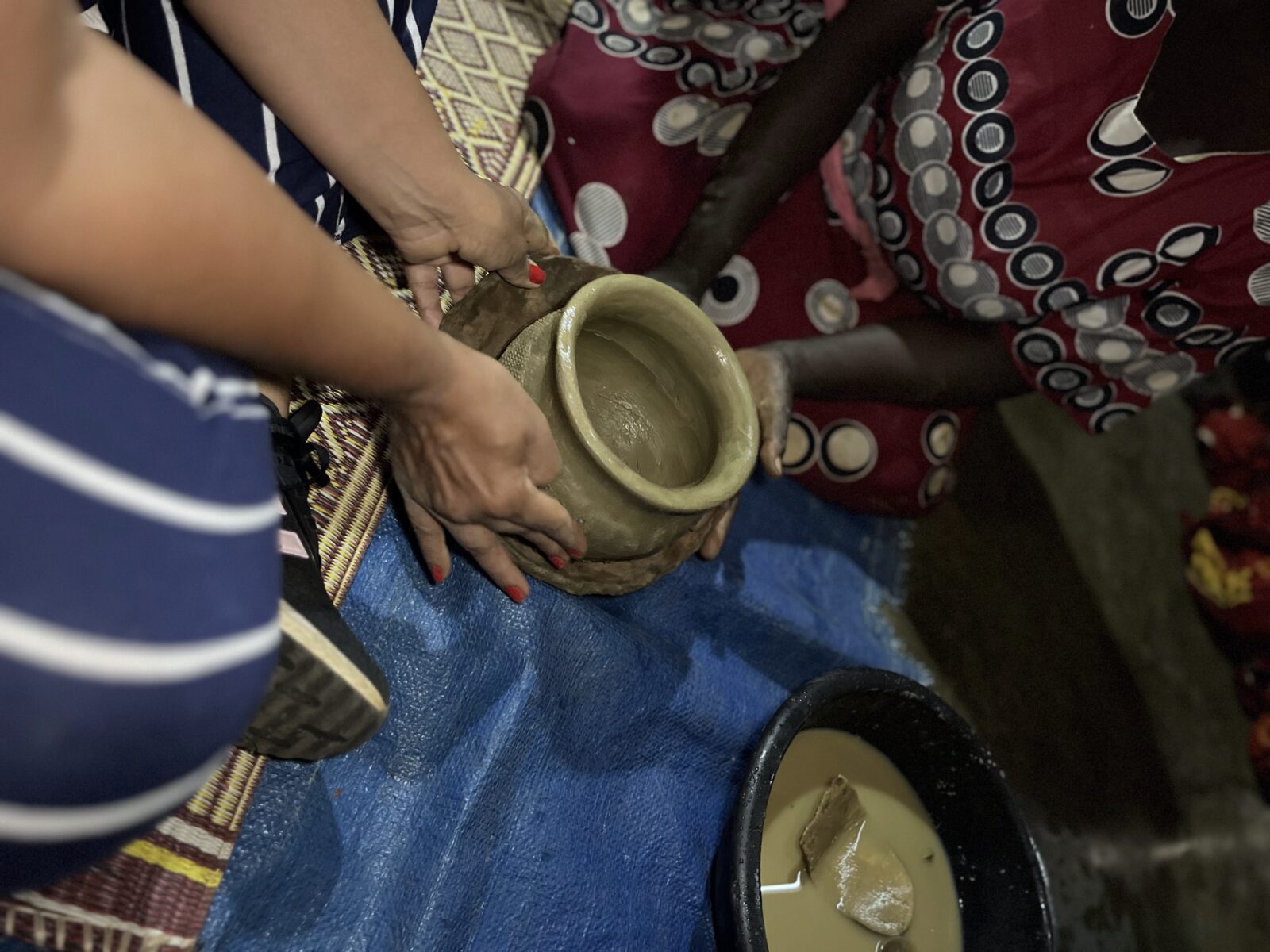 Acholi cultural experience Gulu Uganda pot finish